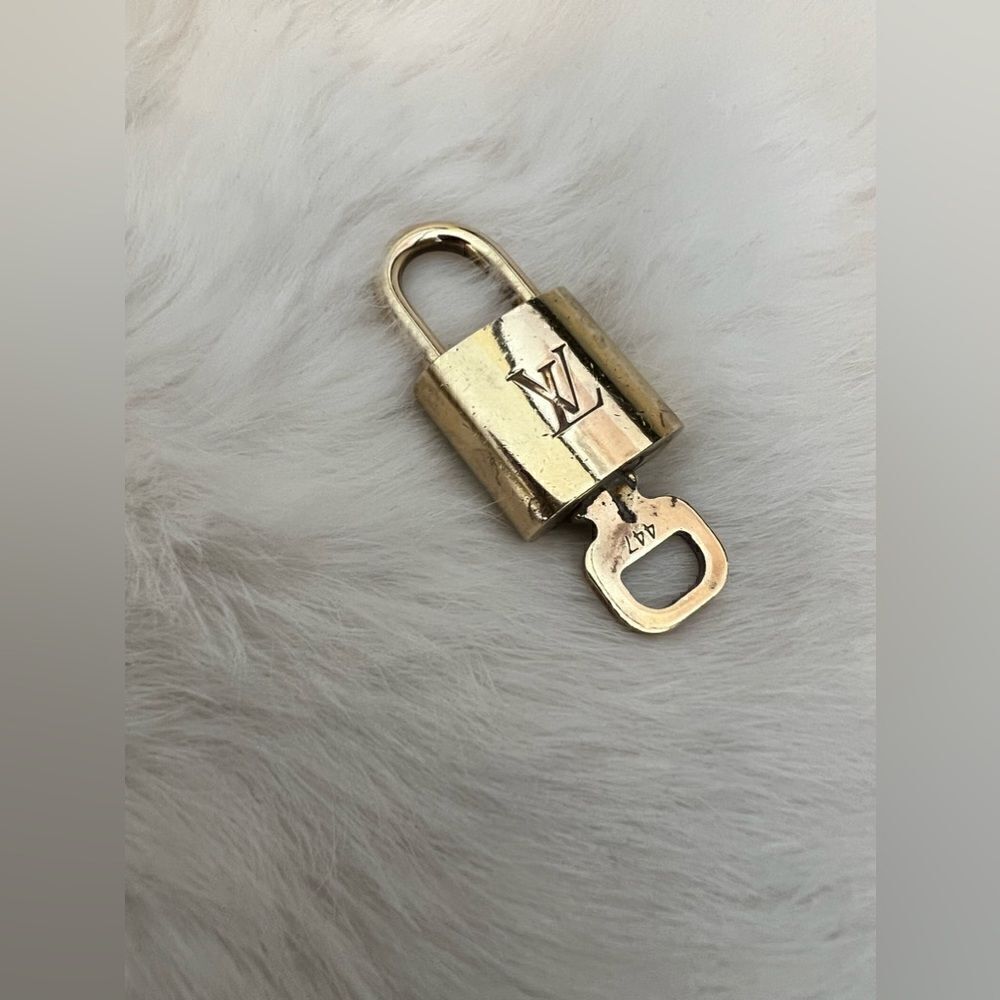 Authentic Louis Vuitton Gold Lock & Key
Matching Set (#447)